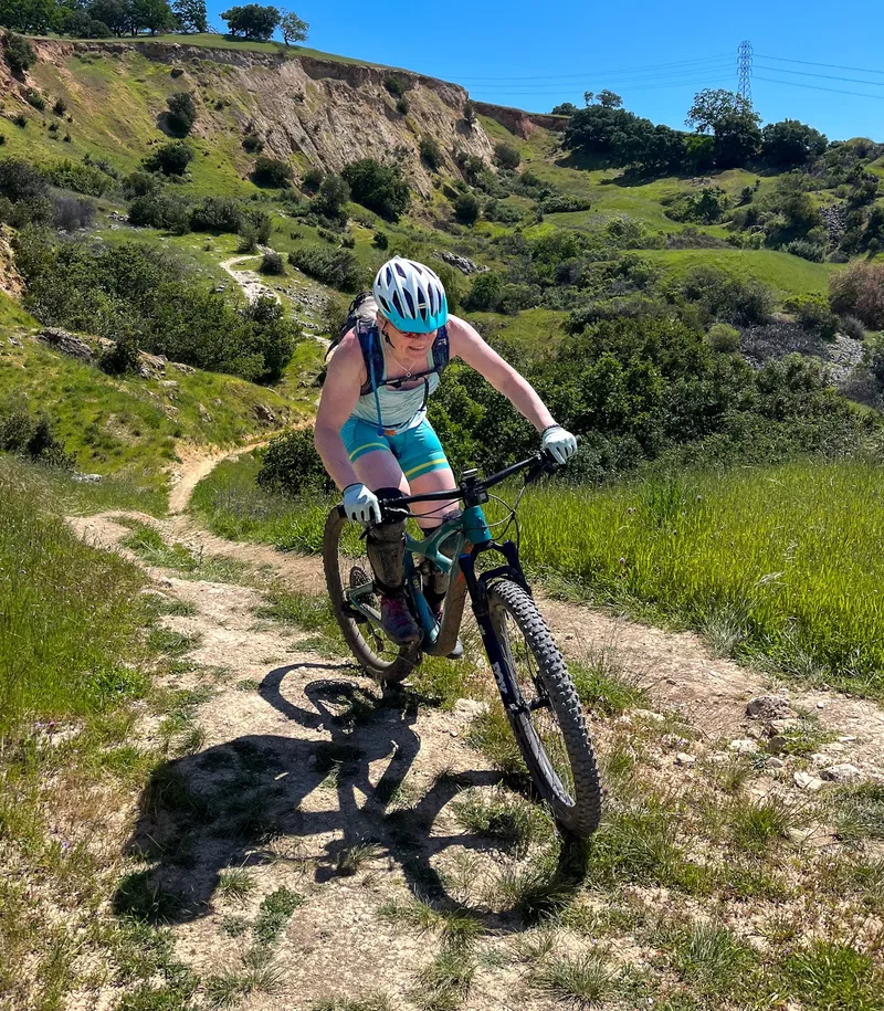 Rebecca riding singletrack in the East Bay hills