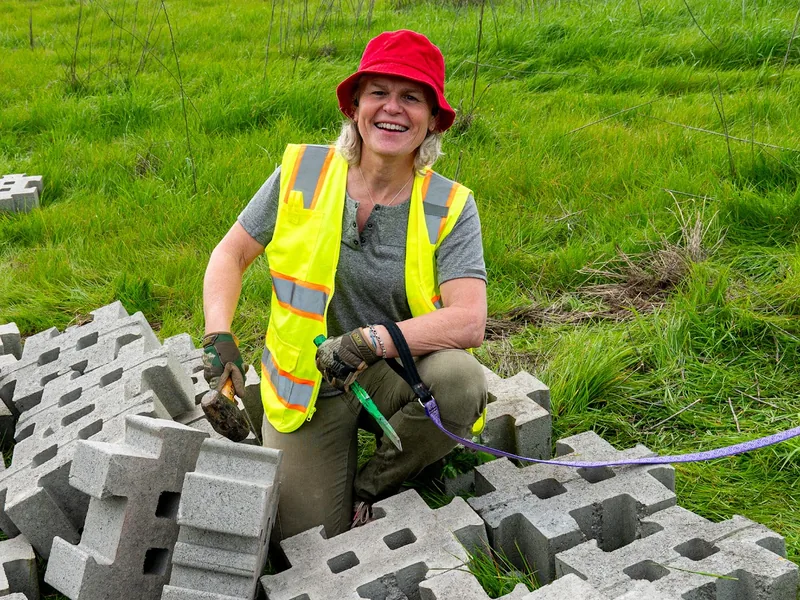 Setting pavers for a trail hardening project at Crockett Hills